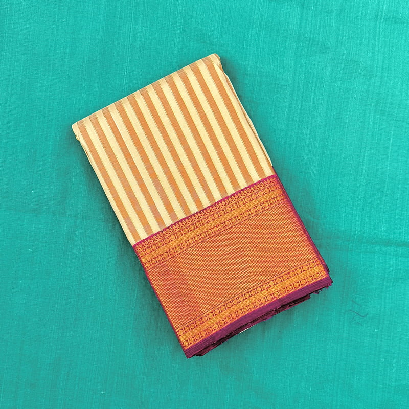 Golden White Kanchipuram with Dusky Saffron Golden White Kanchipuram with Dusky Saffron