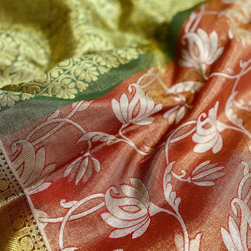 Coral Orange Kanchipuram with Gemstone Green Coral Orange Kanchipuram with Gemstone Green
