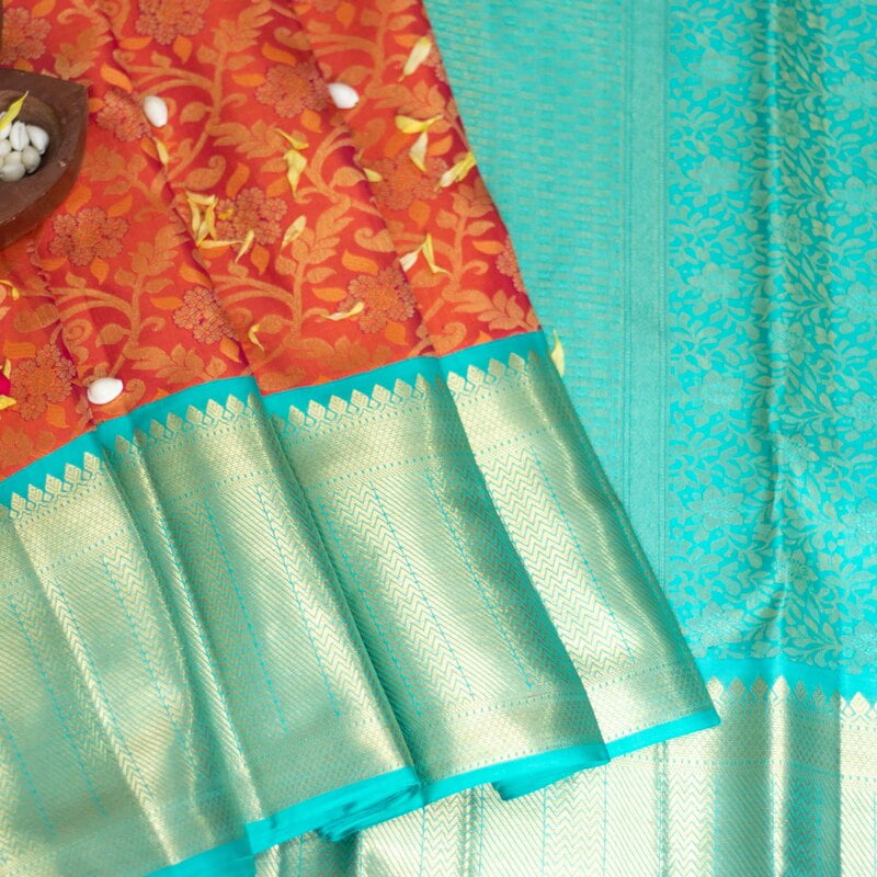 Sunset Peach Kanchipuram with Teal Green Sunset Peach Kanchipuram with Teal Green