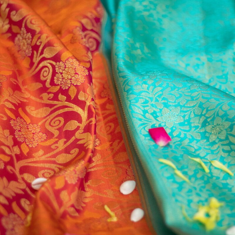Sunset Peach Kanchipuram with Teal Green Sunset Peach Kanchipuram with Teal Green