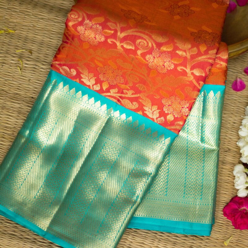 Sunset Peach Kanchipuram with Teal Green Sunset Peach Kanchipuram with Teal Green